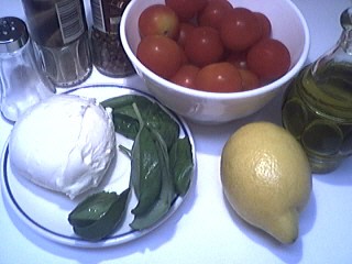 Ingrédients pour la recette : Tomates-cerises à la mozzarella
