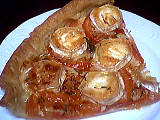 Image : Part de tarte à la tomate et au chèvre
